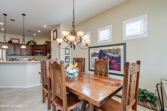 dining space with light tile patterned flooring, visible vents, an inviting chandelier, and recessed lighting