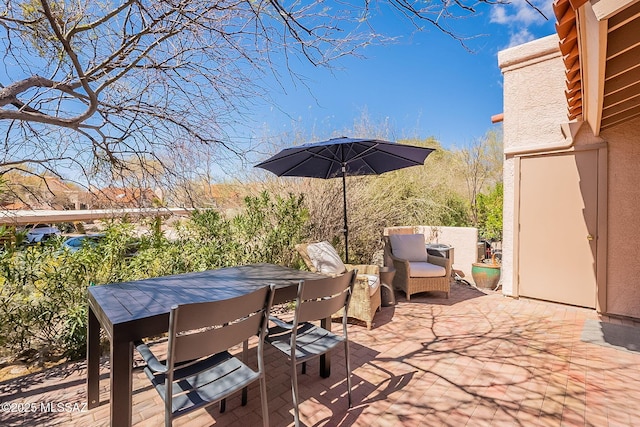 view of patio with outdoor dining space