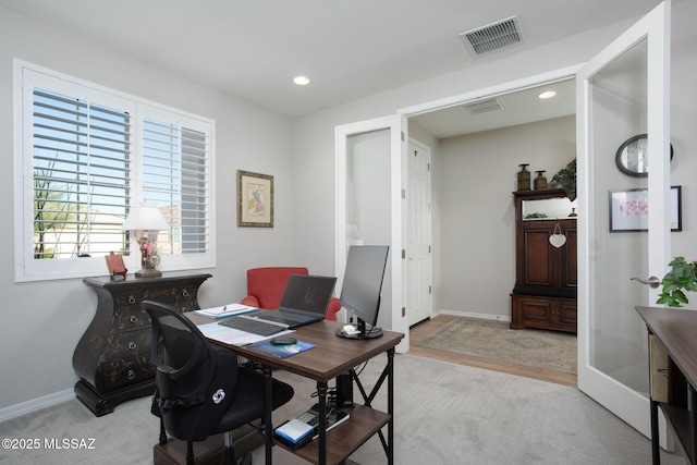 office with baseboards, visible vents, and recessed lighting