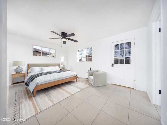 bedroom featuring ceiling fan and light tile patterned flooring