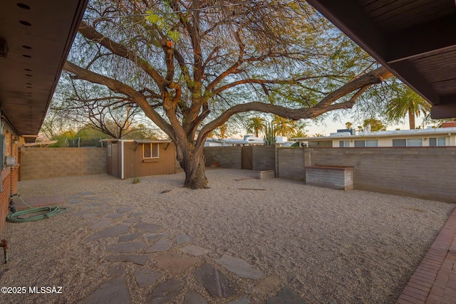 view of yard with a fenced backyard