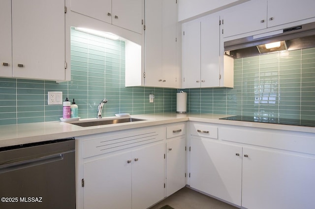 kitchen featuring white cabinets, under cabinet range hood, light countertops, and dishwasher