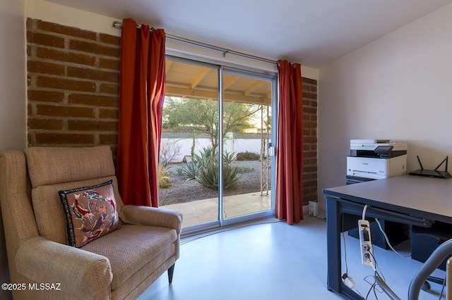 home office featuring finished concrete flooring