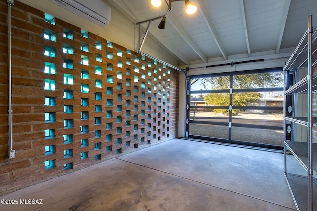 unfurnished sunroom featuring vaulted ceiling with beams