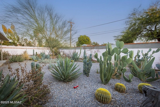 view of yard featuring fence