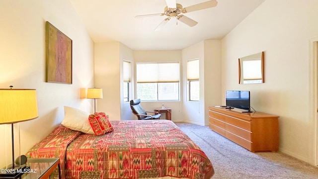 bedroom featuring carpet floors, baseboards, and a ceiling fan