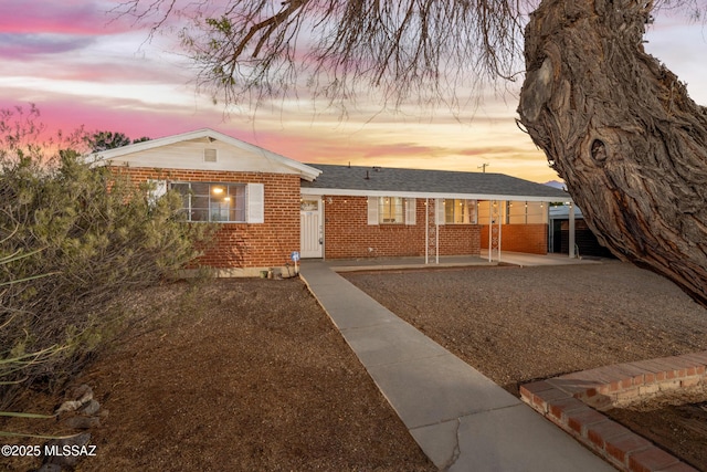 5720 E 4th St, Tucson, AZ 85711 - view of front of house featuring brick siding