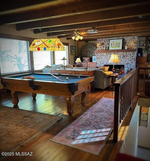 rec room featuring billiards, ceiling fan, beamed ceiling, and wood finished floors