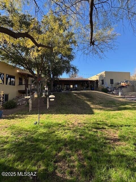 view of community featuring a yard