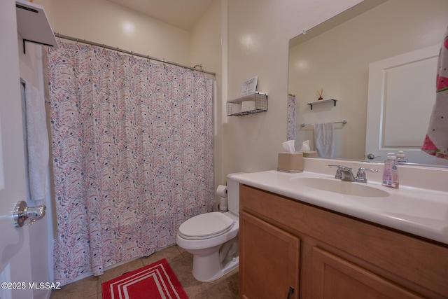 full bathroom with a shower with curtain, tile patterned floors, vanity, and toilet