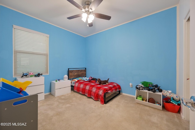 bedroom with baseboards, ceiling fan, and carpet floors