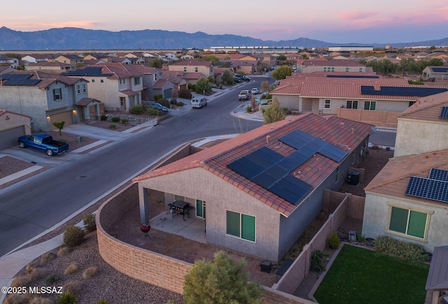 bird's eye view featuring a residential view and a mountain view