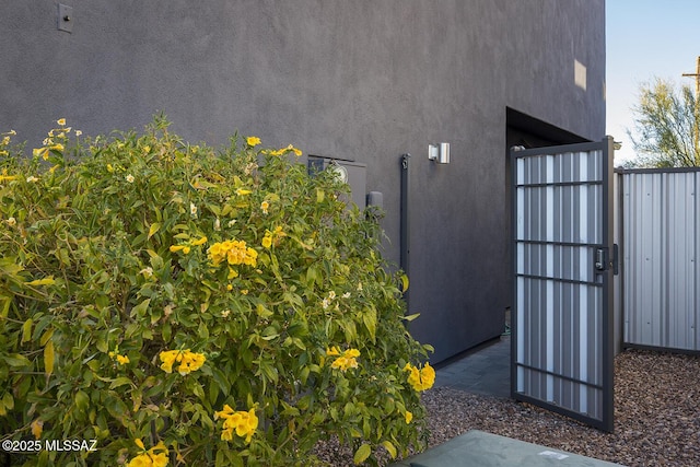 view of outdoor structure with fence