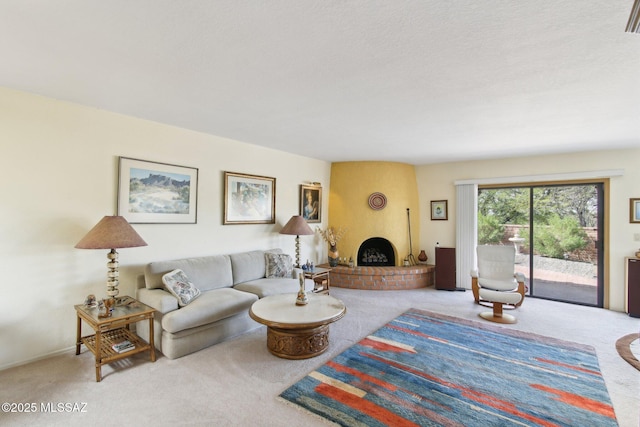 living room featuring carpet floors and a fireplace