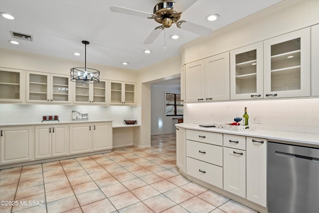 kitchen featuring visible vents, stainless steel dishwasher, light countertops, light tile patterned floors, and glass insert cabinets