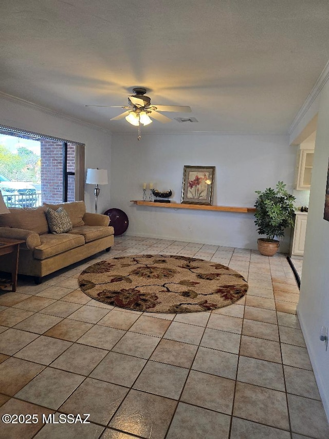 5822 E S Wilshire Dr, Tucson, AZ 85711 - living area featuring crown molding, light tile patterned floors, and ceiling fan