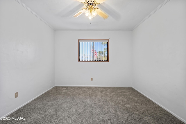 carpeted empty room featuring a ceiling fan, baseboards, and ornamental molding