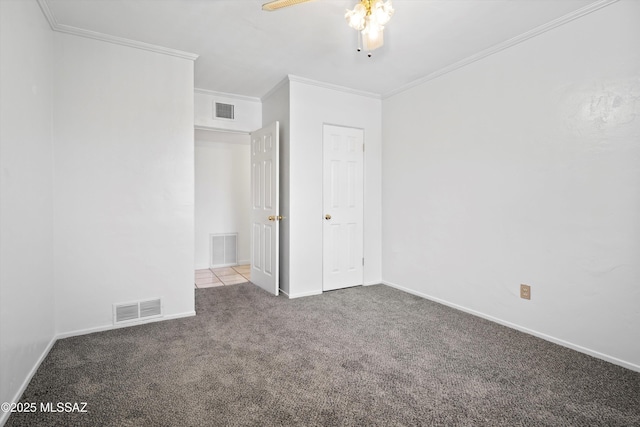 5822 E S Wilshire Dr, Tucson, AZ 85711 - unfurnished bedroom with carpet, ornamental molding, baseboards, and ceiling fan