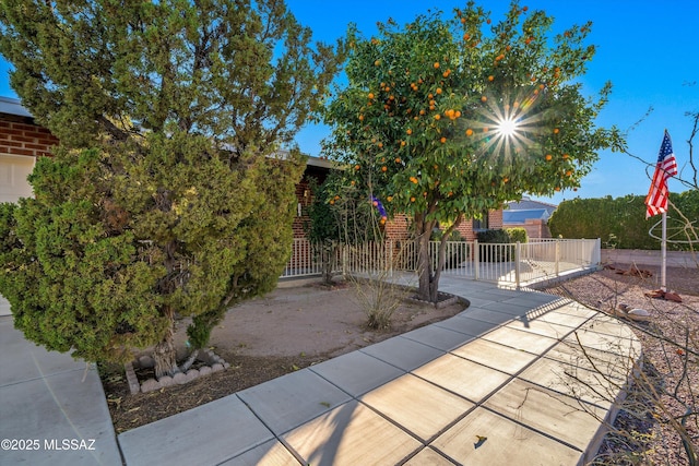 view of patio featuring fence