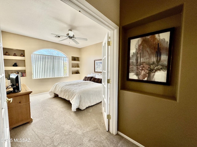 bedroom featuring visible vents, baseboards, and carpet floors