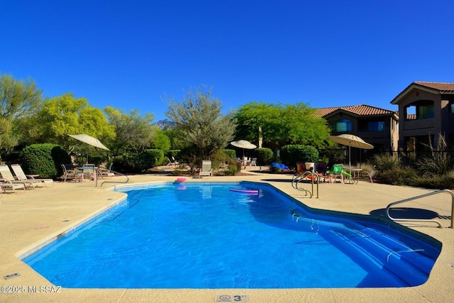 pool with a patio