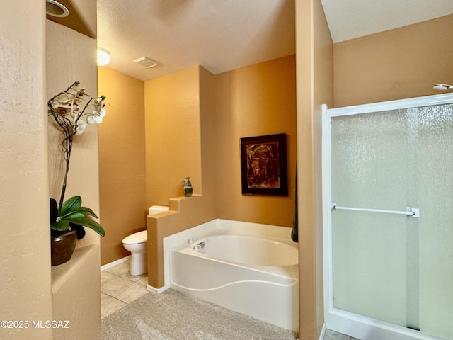 full bathroom with a bath, visible vents, a stall shower, tile patterned flooring, and toilet
