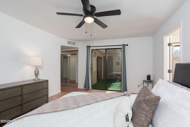 bedroom featuring ceiling fan, access to outside, visible vents, and baseboards