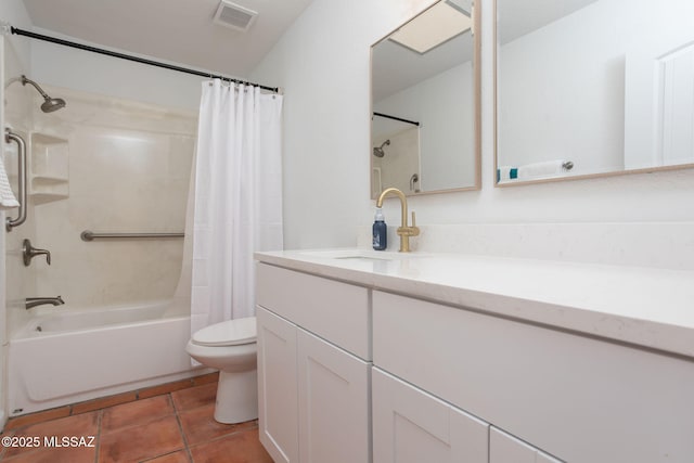 full bathroom with shower / tub combo with curtain, visible vents, toilet, vanity, and tile patterned flooring