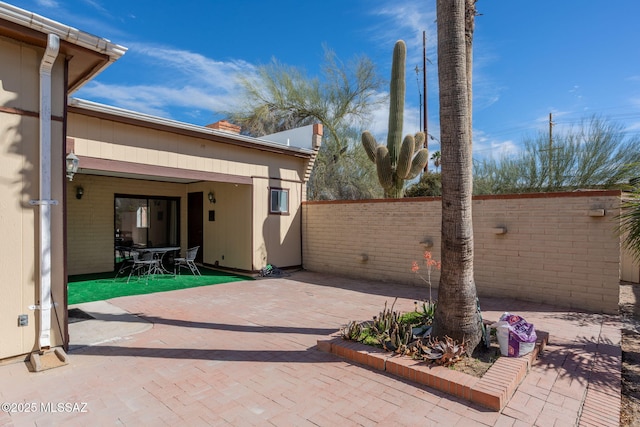 view of patio with fence