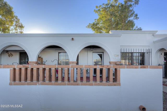 exterior space with stucco siding