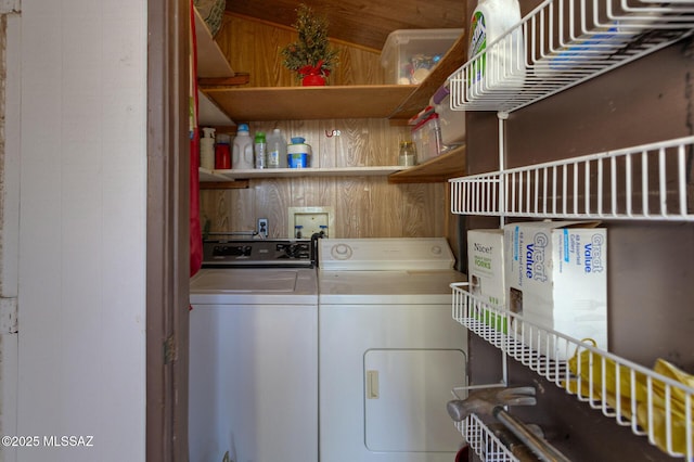 washroom featuring laundry area and separate washer and dryer