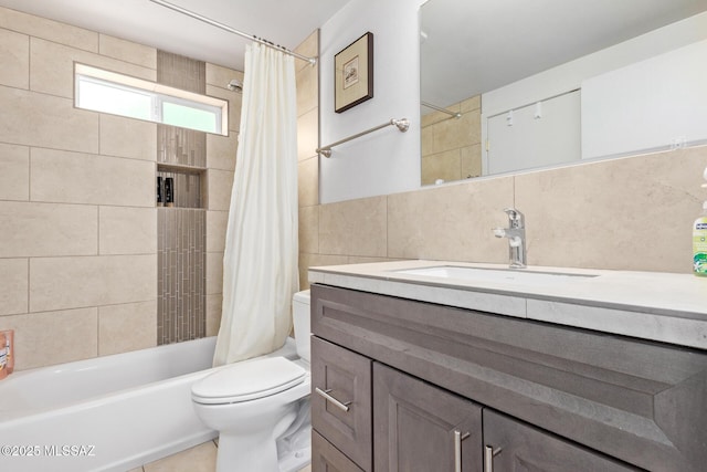 bathroom featuring tile walls, tasteful backsplash, toilet, shower / tub combo, and vanity