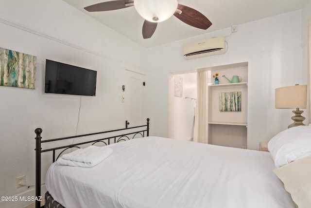 bedroom with a ceiling fan and a wall mounted AC