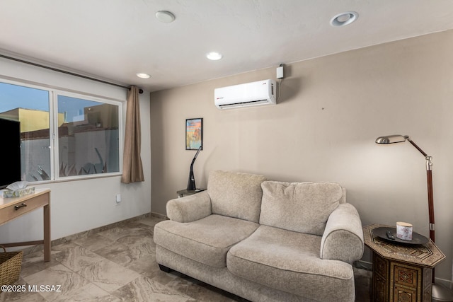 living area featuring marble finish floor, baseboards, an AC wall unit, and recessed lighting