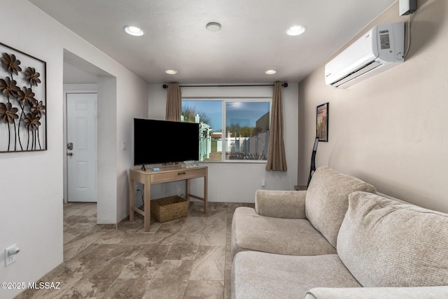 living area featuring recessed lighting, marble finish floor, and a wall mounted air conditioner