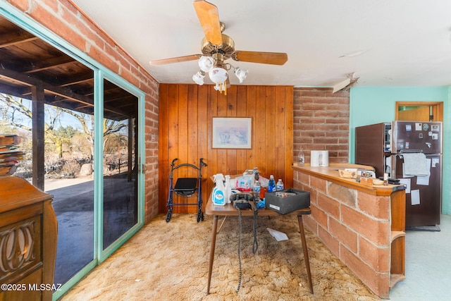 interior space featuring a ceiling fan