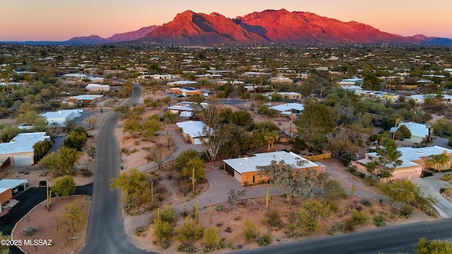 aerial view at dusk with a residential view and a mountain view