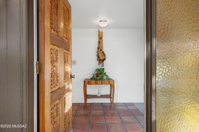 corridor featuring tile patterned floors