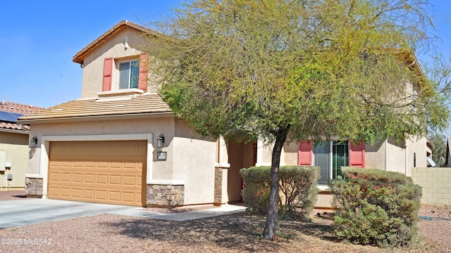 view of front of home featuring a tile roof, stucco siding, a garage, stone siding, and driveway