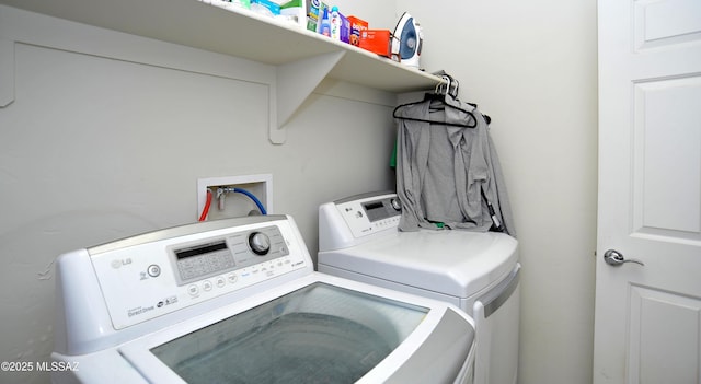 clothes washing area featuring laundry area and independent washer and dryer