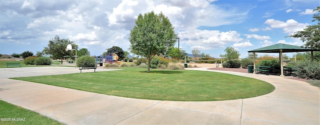 surrounding community featuring a gazebo, playground community, a lawn, and volleyball court