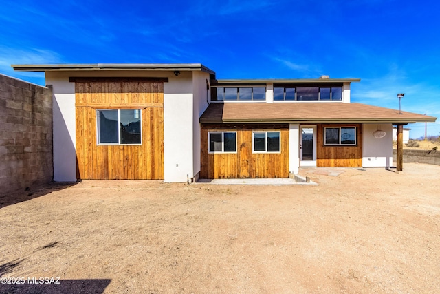 view of front of house with fence