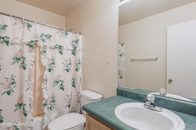 full bath featuring toilet and vanity