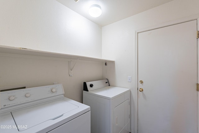 laundry room with laundry area and washer and dryer