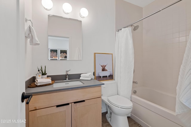 bathroom featuring shower / tub combo, vanity, toilet, and tile patterned floors