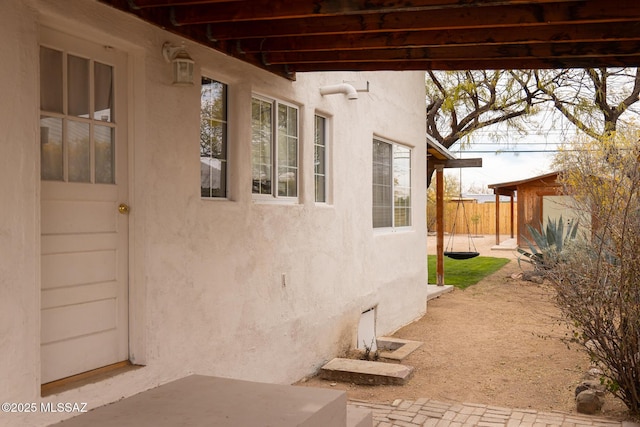 view of patio / terrace featuring fence