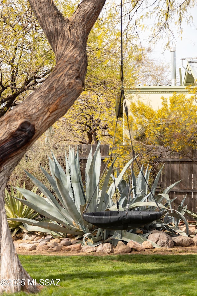 exterior details featuring fence