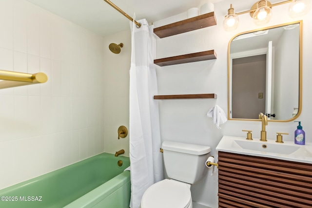 bathroom featuring vanity, shower / bath combo with shower curtain, and toilet