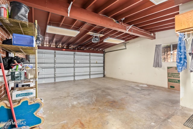 garage featuring a garage door opener