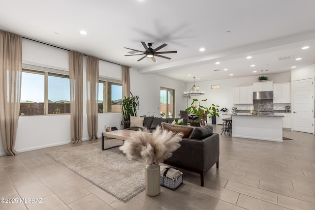 living room with recessed lighting, visible vents, ceiling fan, and light tile patterned flooring